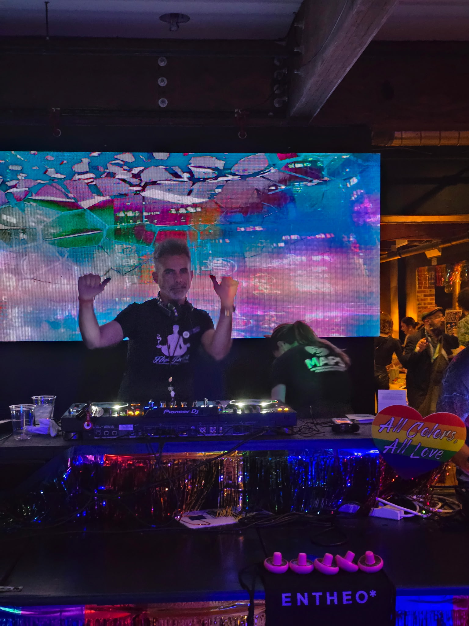 Rev Hooman performing at a community gathering